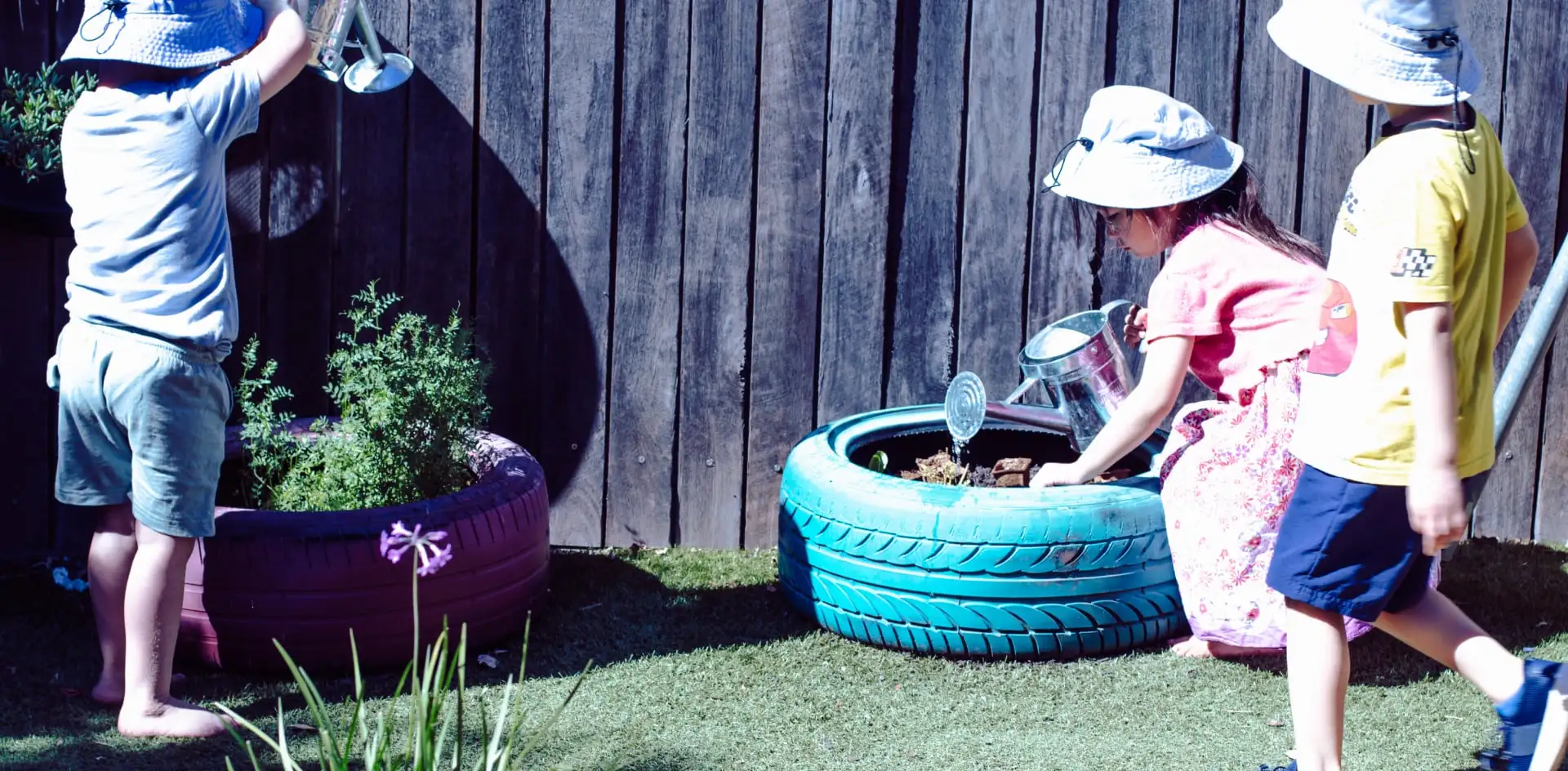 Children watering plants - Little Kingdom Childcare in Mount Tarcoola, Geraldton